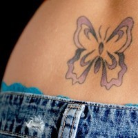 Lower back tattoo, designs , delicate violet butterfly
