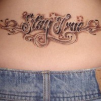 Lower back tattoo, stay true, beautiful decorated with stars inscription