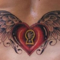 Lower back tattoo, heart winged to open with key