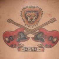 Lower back tattoo, two crossed guitars, angry lion , dad