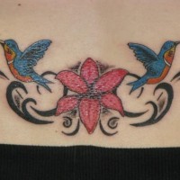 Lower back flower and hummingbirds tattoo
