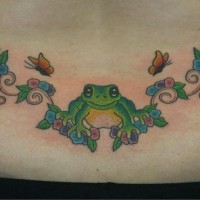 Lower back frog with flower tracery  tattoo