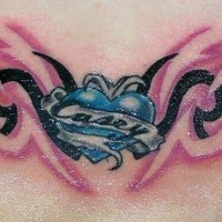Lower back tattoo, casey in blue heart, fireing