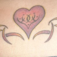 Lower back tattoo, beautiful heart with hieroglyph