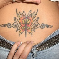 Lower back tattoo, designed orange butterfly