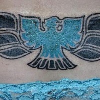 Lower back tattoo design, blue, styled bird, black wings