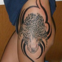 Beautiful , black styled leopard lower hip tattoo