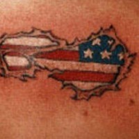 Usa flag under skin rip tattoo