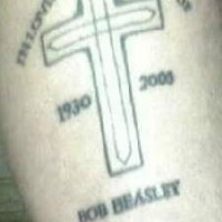 Latin cross in loving memory tattoo