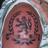 Lion crest memorial tattoo