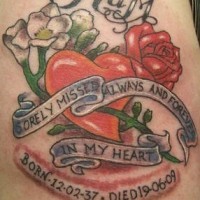 Flowers and red heart memorial tattoo