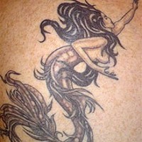 Regular black ink mermaid tattoo