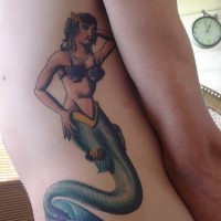 Detailed mermaid tattoo on side