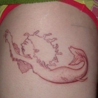 Cartoonish red mermaid tattoo