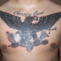 Eagle in cactuses tattoo on chest