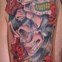 Dia de muertos skulls coloured tattoo