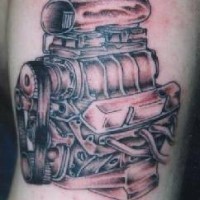 Detailed car engine tattoo