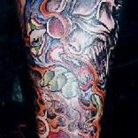Demonic themed full leg tattoo