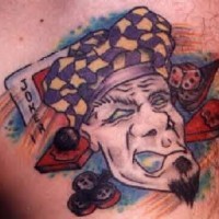 White gambling joker mask tattoo