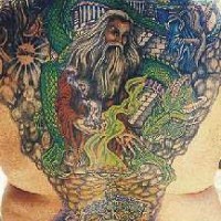 Super detailed fantasy tattoo in colour on back