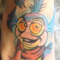 Porträt kleines Grinches Tattoo am Fuß