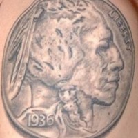 Native american on coin tattoo