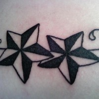 Two stars with tracery tattoo