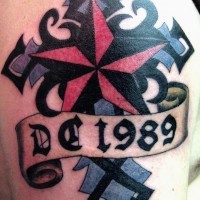 Tribal cross and star tattoo