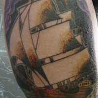 Sailing vessel in storm coloured tattoo