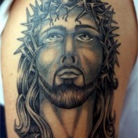 Old school tattoo with jesus face