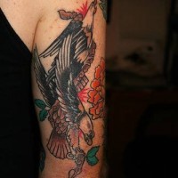 Traditional colored tattoo with two black eagles