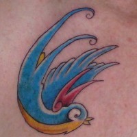 Traditional tattoo with colorful bird