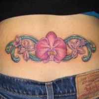 Orchid flower tracery tattoo on lower back