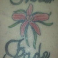 el tatuaje de un flor de orquidea de color rosa