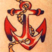 Small traditional tattoo with red anchor