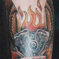 Ride free in flames biker tattoo