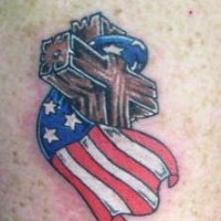 Cross wrapped in usa flag tattoo