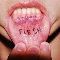 Permanent lip tattoo, flessh, thin black letters