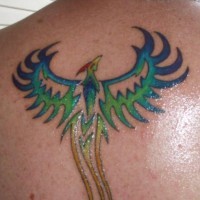 Colourful tribal phoenix tattoo