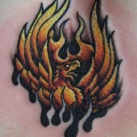 Small phoenix in flames tattoo