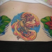 Phoenix coloured tattoo on lower back