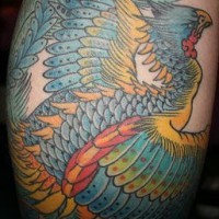 Nice colourful magic bird tattoo