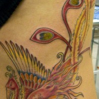 Colourful magic fire bird tattoo