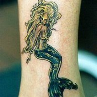 Naked blonde mermaid tattoo