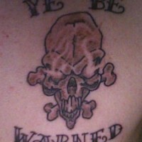 Ye be warned cranio tatuaggio