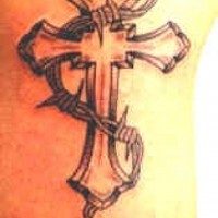 Cross and barb wire tattoo