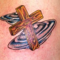Wooden cross and flying saucers tattoo