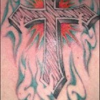 Cross with tribal tracery tattoo