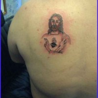 Small jesus portrait tattoo