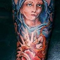 Woman in blue cloak and heart tattoo